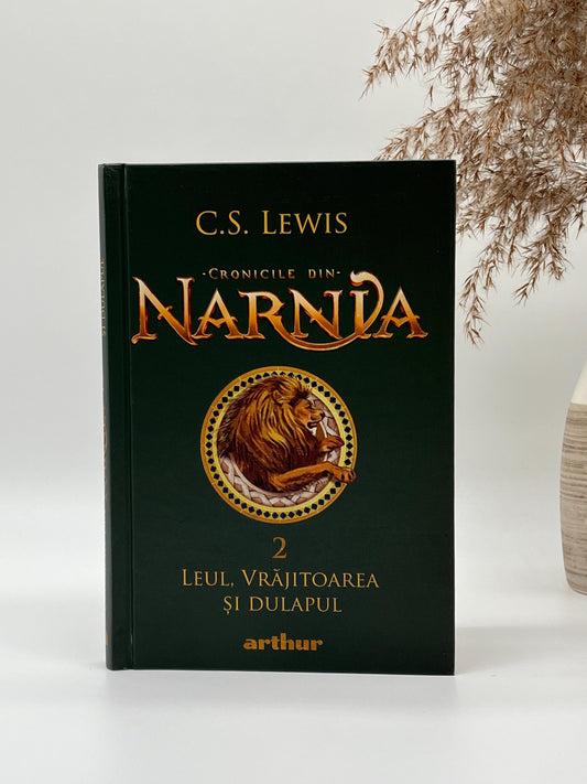 Șifonierul, leul și vrăjitoarea [Cronicile din Narnia - Vol 2]
C. S. Lewis